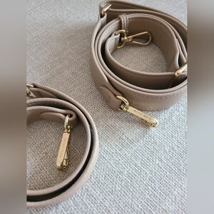 Mina Baie shoulder straps